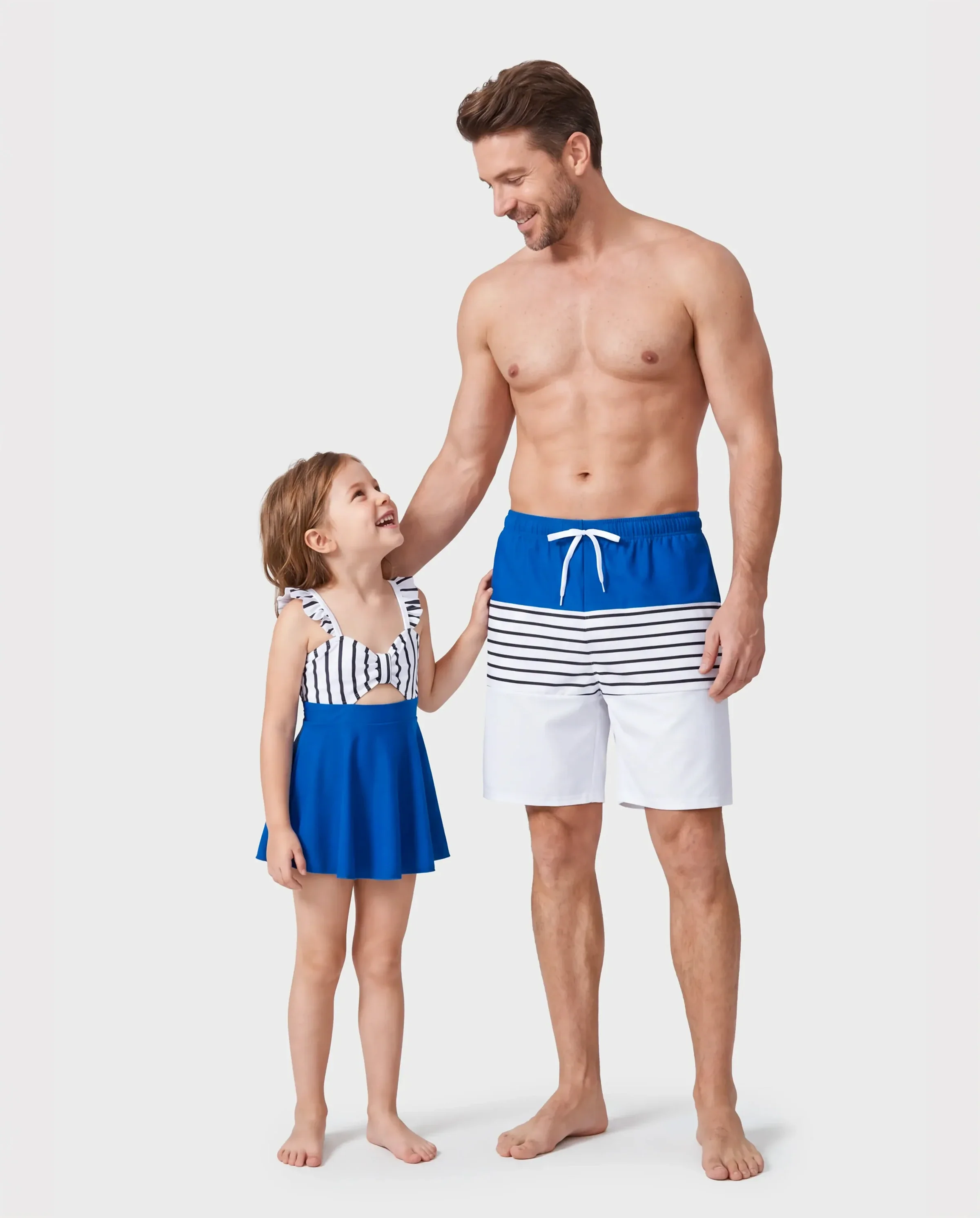 Daddy & Daughter Swimsuit Colorblock Drawstring Swim Trunks or Striped Blue Spliced Tankini with Cross-Front, Tie-Back, and Thin Straps Color block