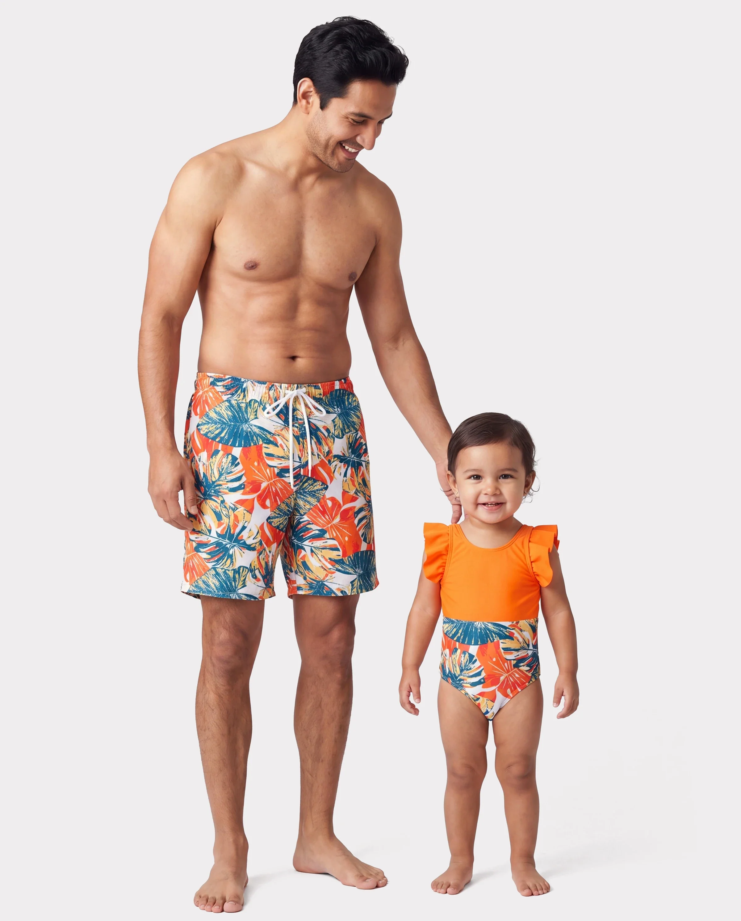 Daddy & Son Orange and All Over Tropical Plant Print Splicing Ruffle Swim Trunks Shorts Orange color